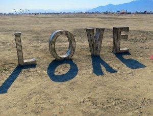 Shadowy love at Burning Man 2014. Photo by Curtis Mekemson.