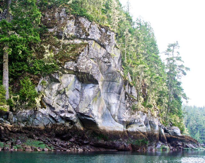 First Nation people had chosen this rock on Berry Island in Blackfish Sound, British Columbia as the location for a pictograph warning people to stay off of the island.