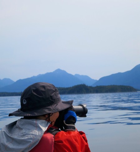 Peggy Mekemson prepared to photograph whales in Blackfish Sound, British Columbia. Photo by Curtis Mekemson.