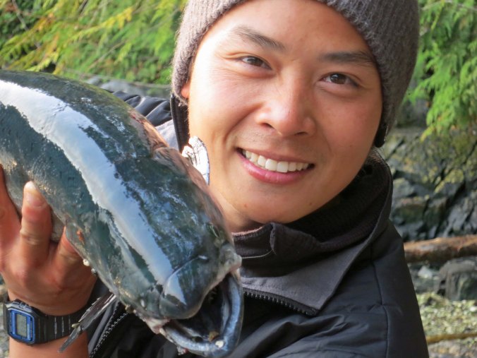 Quy was happy to pose with the salmon, until...