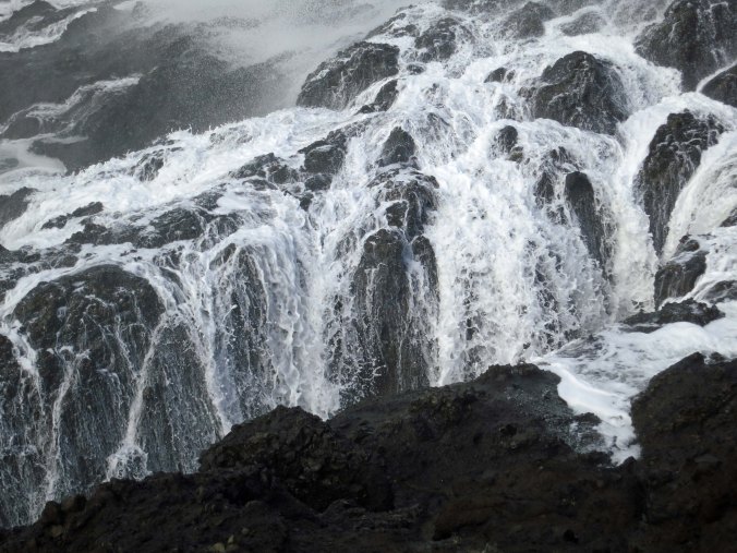 Wave retreats at Depoe Bay, Oregon. Photo by Curtis Mekemson.
