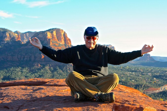 Peggy catches a photo of me in my one minute quest while sitting on the vortex rock. (Photo by Peggy Mekemson.)