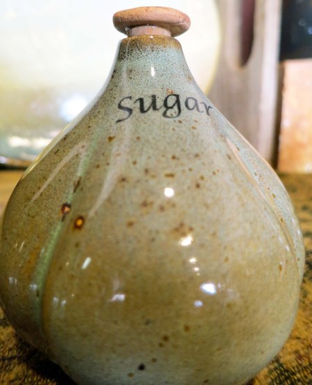 I found the small containers she made for sugar, salt, pepper and other spices quite unique.