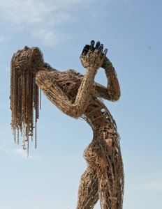Nude sculpture celebrates the break of day at Burning Man.