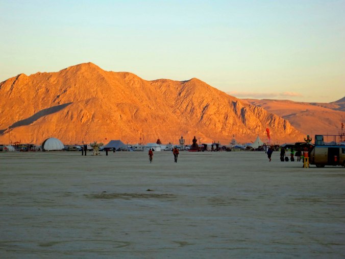 Sunset reflected on a mountain at Burning Man in the Black Rock Desert.