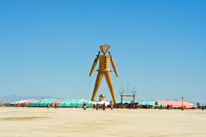 The Man at Burning Man dominates the Playa and serves as a landmark for lost Burners.