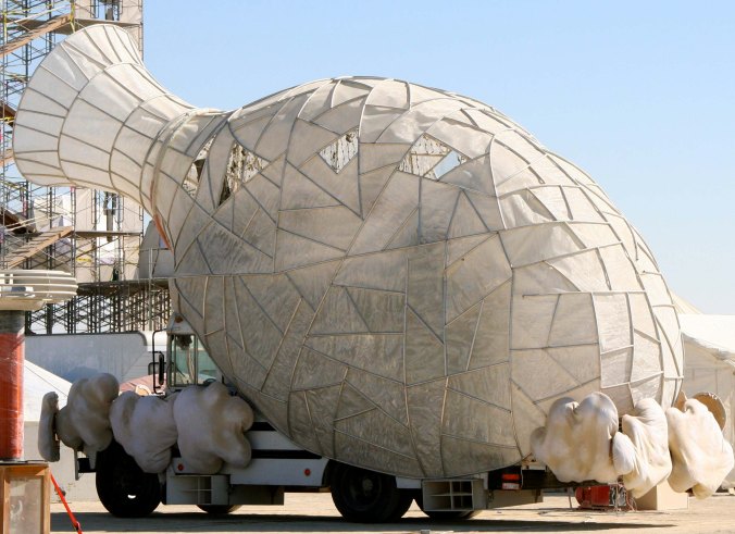 The same mutant vehicle vase shown above, parked in Black Rock City during the day.