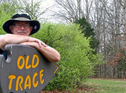 I wondered if Peggy had some type of message in mind when she asked me to pose for this photo. The sign is pointing toward portions of the historical Trace that are still found along the Parkway.