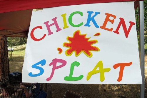 Last year I featured the Chicken Splat contest on my post about Buncom Day, so I will close with it this year. Numbered squares are placed in the bottom of the chicken cage. You bet on which square the chicken will poop on. NEXT BLOG: Back to Santorini.