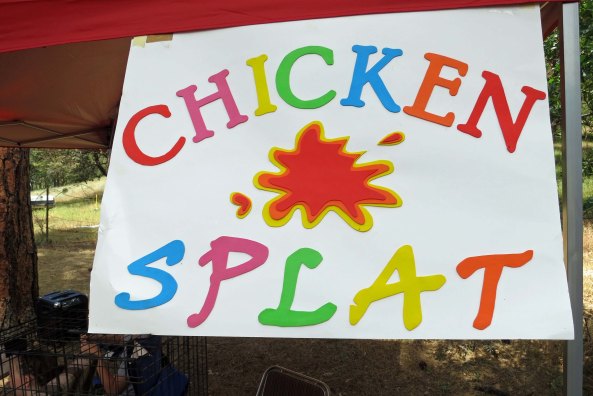Last year I featured the Chicken Splat contest on my post about Buncom Day, so I will close with it this year. Numbered squares are placed in the bottom of the chicken cage. You bet on which square the chicken will poop on. NEXT BLOG: Back to Santorini.