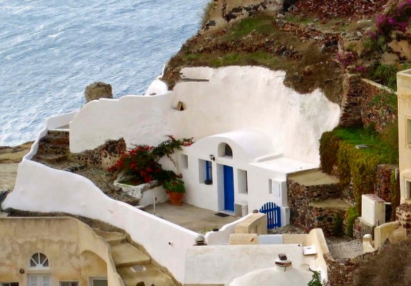 Homes are actually built into the volcanic cliff as this photo illustrates. The added insulation means the houses are cool in the summer and warm in the winter.