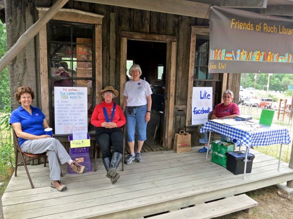 Peggy and fellow board members staffed the Friends of the Ruch Library book sale. One of Ruch's three buildings, the long abandoned Post Office was their venue.