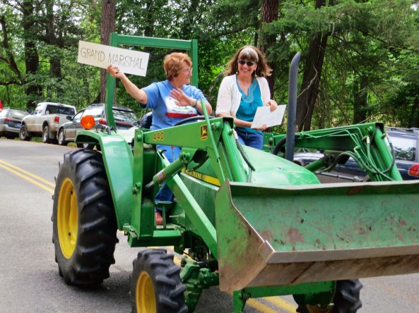 Every parade needs a Grand Marshall. She even carried a handmade sign announcing who she was. A writer for the Medford Tribune was along for the ride.