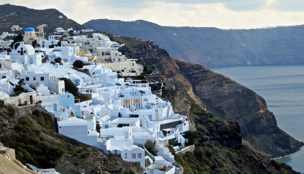 The town of Oia overlooks the caldera of what was once a volcano and is now filled with the Aegean Sea. 