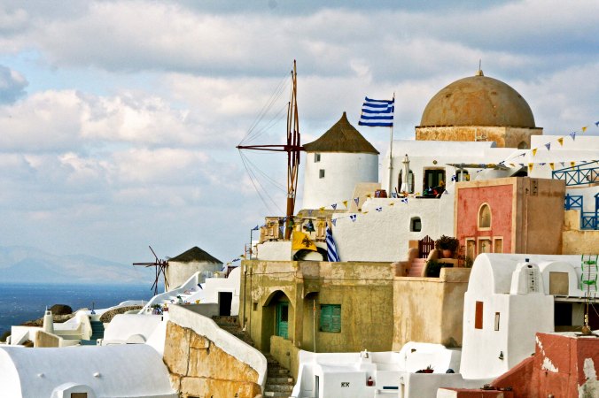 Peggy caught this photo of an old Santorini windmill that I found quite stunning. We found similar windmills won other Greek islands.