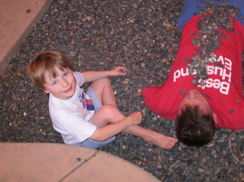 As you might imagine, the boys found burying dad in rocks, as Connor is doing here, to be quite amusing.