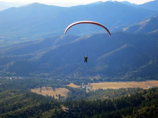 Peggy paragliding over the Applegate Valley.