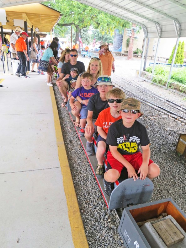 Everyone climbed on the train at the Medford Railroad Park.