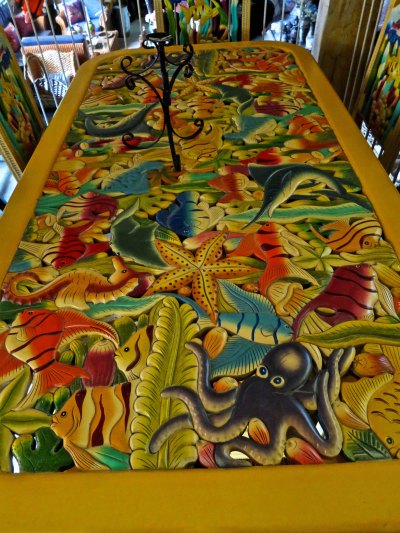 I would love to have a table like this. You would never be at a lack for conversation when you had guests over.