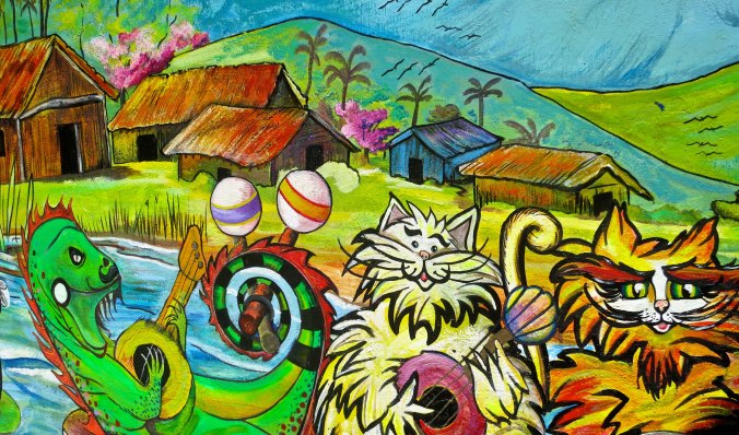 Cool cats, perhaps— as jazz musicians were once referred to as, and a musical iguana were the subject of this mural we found on the Rio Cuale.