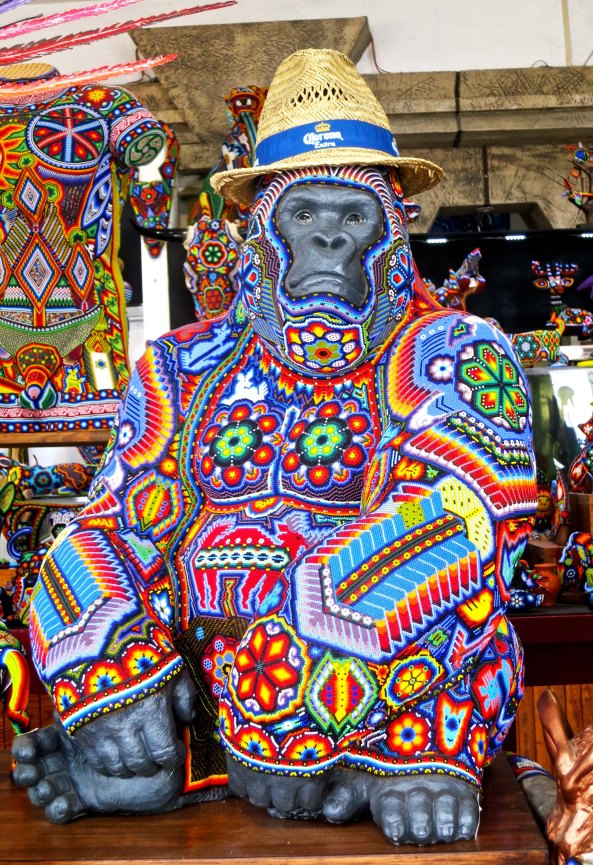 Anybody want to buy a great ape? This big fellow is decorated with thousands of beads, Huichol Indian style. The shop was packed full of Huichol art. Peggy bought a small turtle. Apparently the ape was a little large to carry home on the plane. 