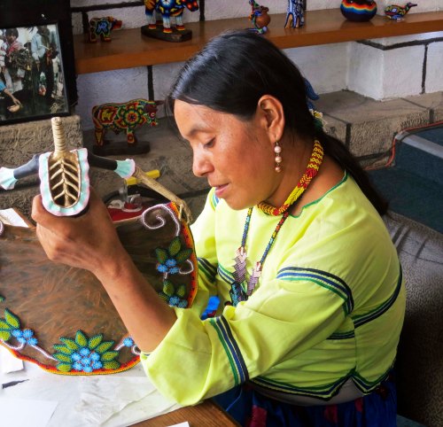 A Huichol artist worked on creating a Catrina in one of the shops we visited.