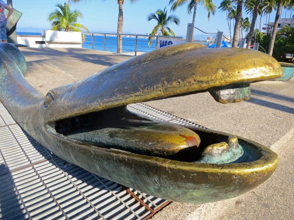 …this sea monster with a large mouth. (Check out his tongue and the hand pointing where food is supposed to go.)