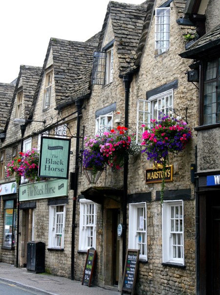 A village scene from Cirencester, known as the “Capital of the Cotswolds.” The term “cester” means Roman fort indicating the origin of the village. 