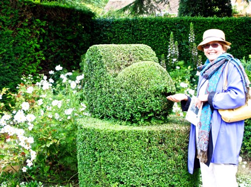 Jane and a sculptured hedge.