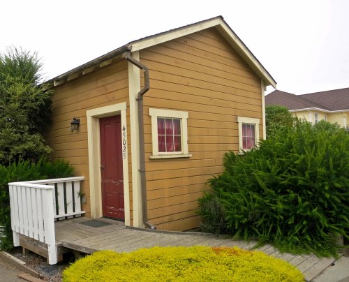 This early home fits the description of "tiny homes" being built today. There was a sign next to it I found touching:" Watch out for the old dog."