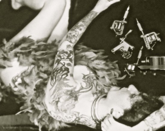 The tattoo machines on the right are capable of producing sophisticated body art.