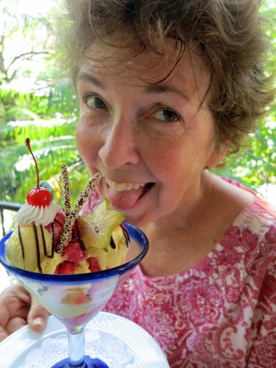 Numerous good restaurants in Puerto Vallarta always tempt us. Peggy chomps down on a tropical creation.