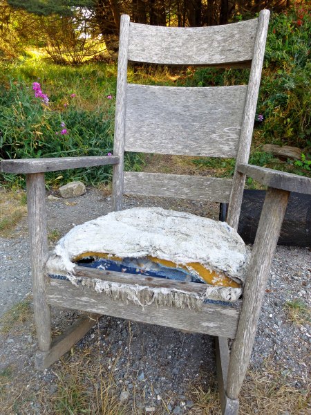 I hound this old rocking chair sitting alone Highway one. All it needed was an old codger to sit in it.