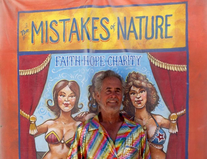 My friend Tom Lovering, good naturedly posed with some of the sideshow art. 