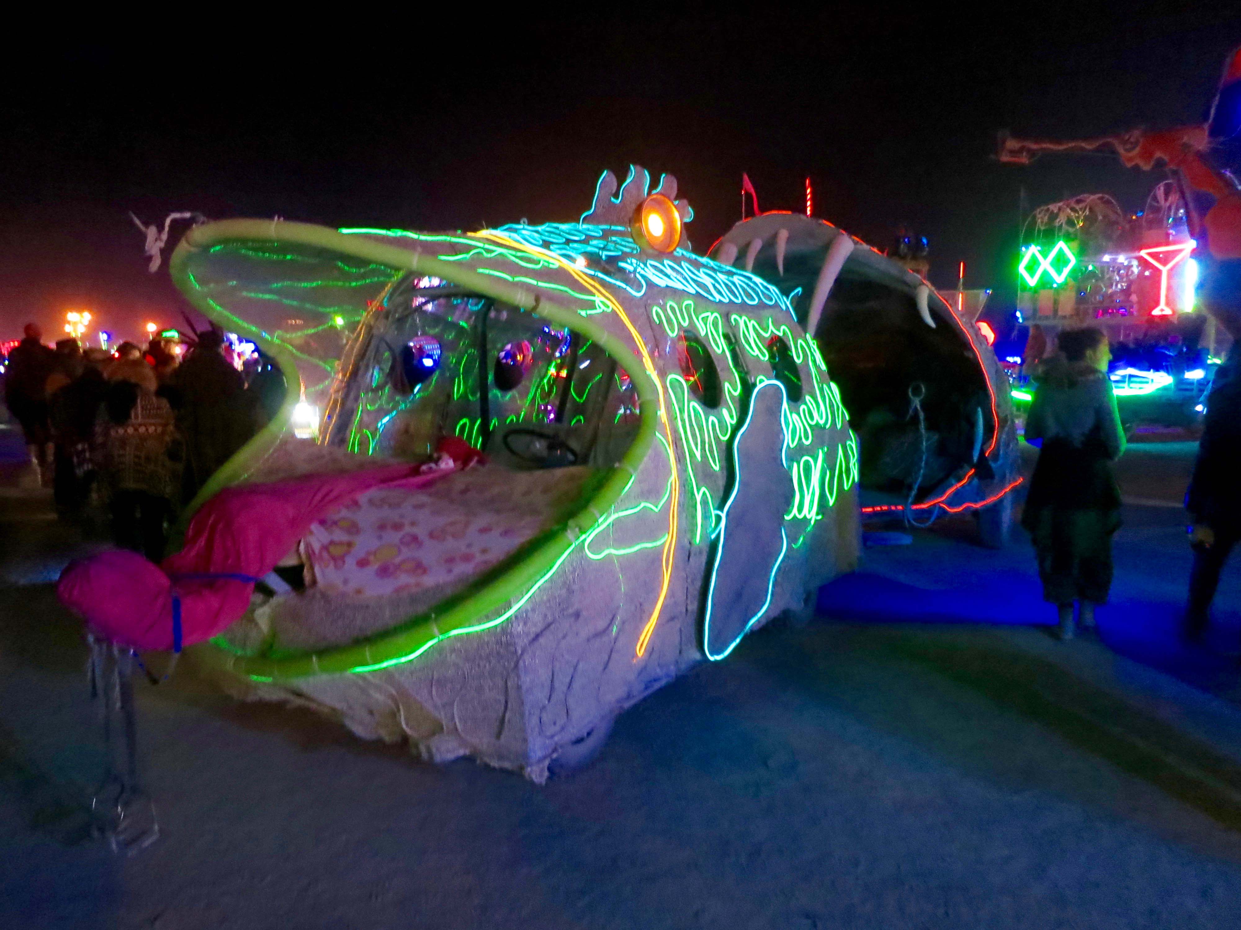 13 Fish eating fish at night mutant vehicle at Burning Man