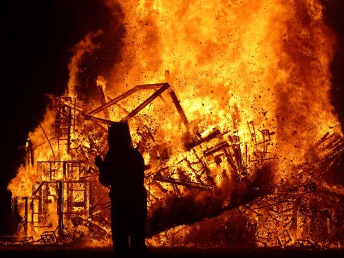 The temple burned quickly and fell to the ground. I wonder if the Burner was warming his hands or applauding. (Photo by Don Green.)