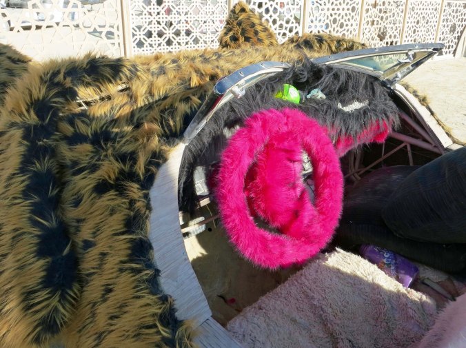 Check out her snazzy steering wheel.