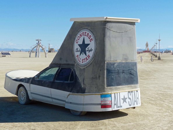 Theses Burners had the clever idea of decorating their car like a Converse tennis shoe.