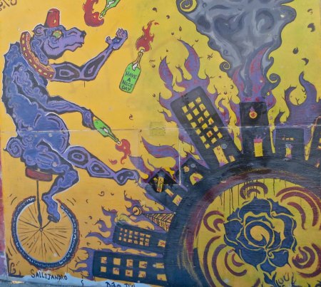 A bear riding a unicycle while juggling flaming bottles— another carnival theme.