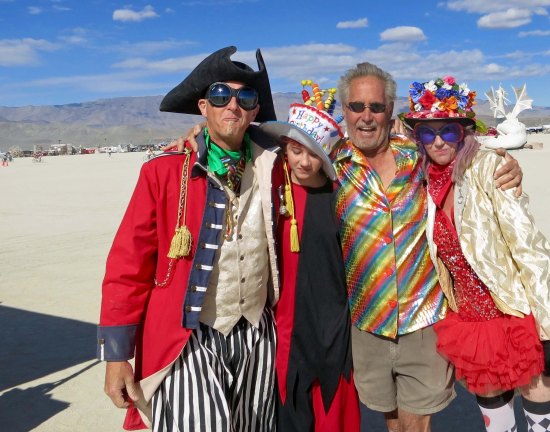 Tom decided he needed a hug from these people who were celebrating their daughters birthday. Judging from the look of the wife, I think it fell under the title of long uncomfortable hug.