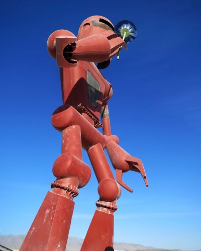 2015 Burning Man robot sniffs flower