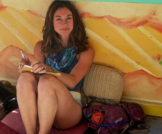 I identified with this woman as she sat alone and worked on her journal, capturing her experience at Burning Man. It could have easily been me.