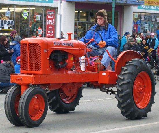 Old tractor featured in 2016 Fur Rondy Parade in Anchorage, AK.