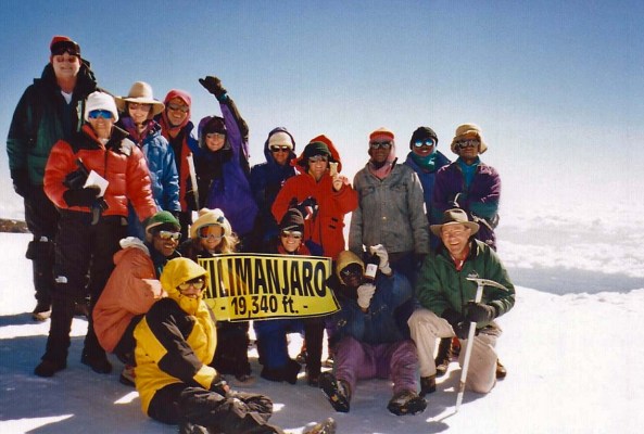Bone celebrates on top of Mt. Kilimanjaro!