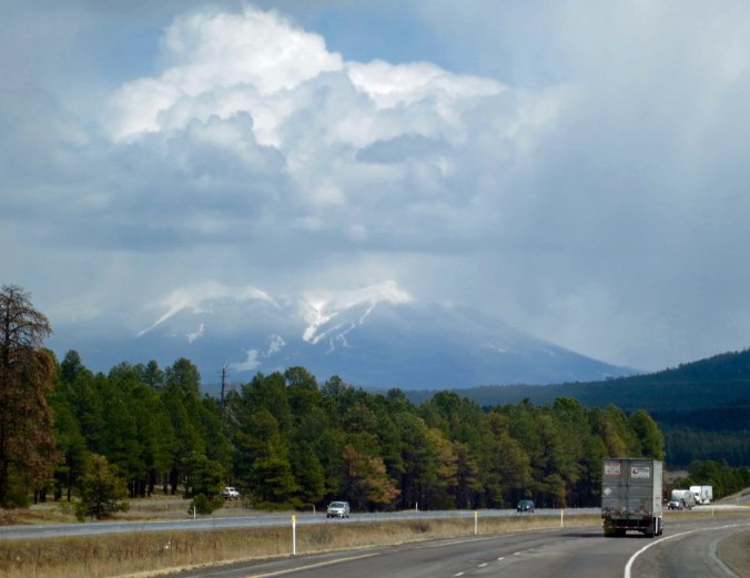 A storm rages over the San Francisco Mountains. Hopi legend has it that their Kachina gods wander the mountains during storms. Apparently they don't like to be disturbed. Nasty things can happen to the unweary human. 