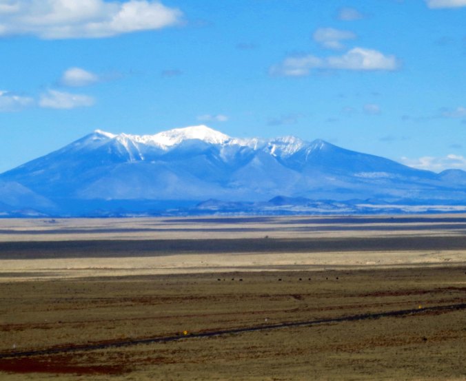 Another view of the San Francisco Mountains— this time from the east. Flagstaff nestles at their base.
