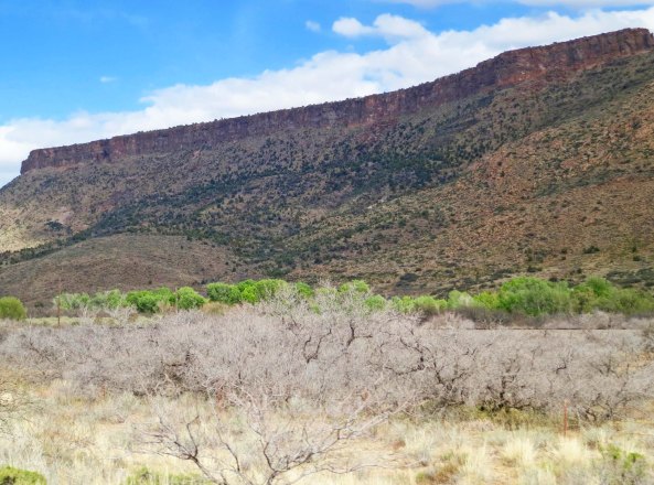 A mesa above the highway. Traveling over the mets and beyond will bring you to the Grand Canyon.