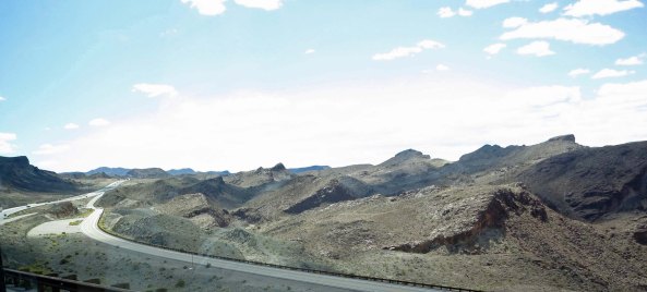 A high four multi-lane bridge has replaced crossing over Hoover Dam when traveling between Nevada and Arizona. This shot looks down on the old highway I was following after climbing out of the canyon.