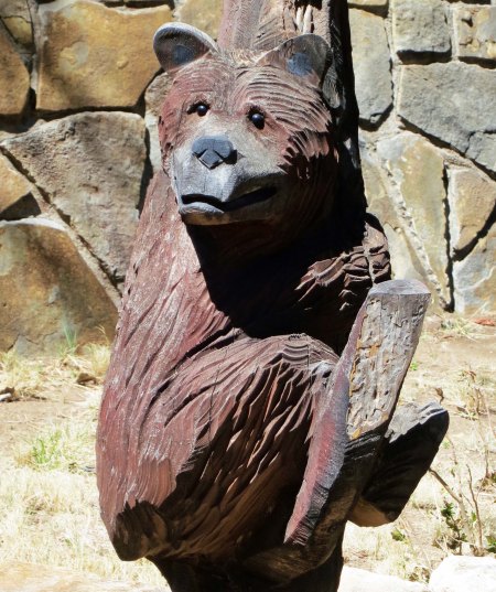 This small statue of a bear cub climbing a tree is at Smokey's grave site.