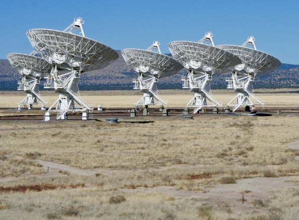 This photo shows the rails that the radio telescopes travel on. Once the telescope arrives at it preset positions it is bolted down and plugged in to the power and fiber optic cable system. 